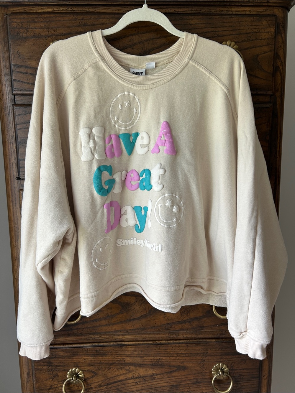 SmileyWorld 'Have A Great Day' Cream Crewneck Sweatshirt